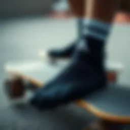 Black Adidas no show socks on a skateboard deck