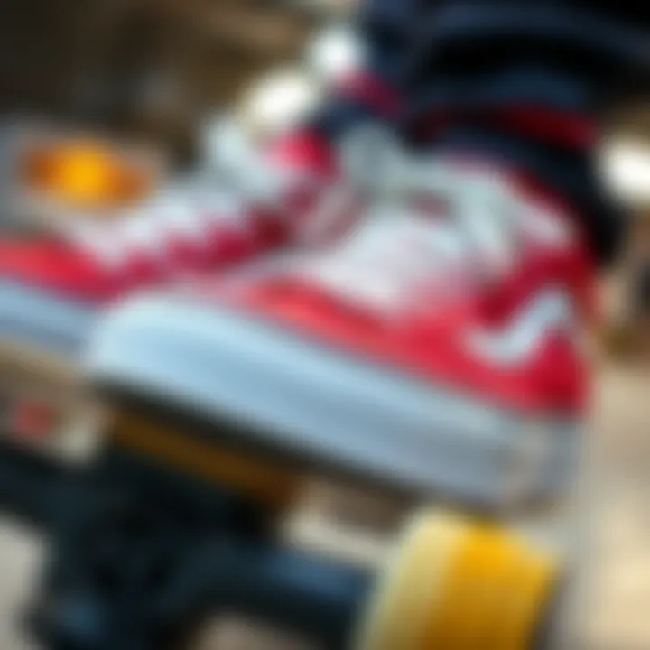 Close-up of red, black, and white shoes on a skateboard