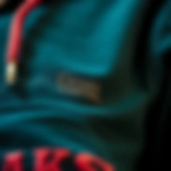 Quality Craftsmanship Close-up shot of the fabric and stitching of the Crooks Castles hoodie, showcasing quality craftsmanship.