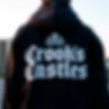 The iconic Crooks Castles logo displayed prominently on the hoodie.