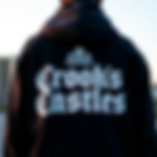 The iconic Crooks Castles logo displayed prominently on the hoodie.