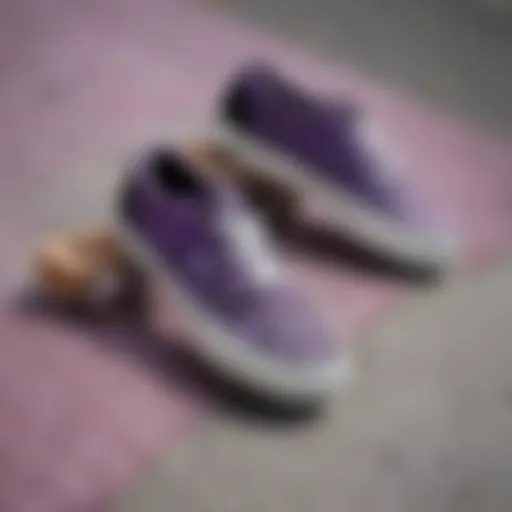 Close-up of purple and black checkered Vans on a skateboard