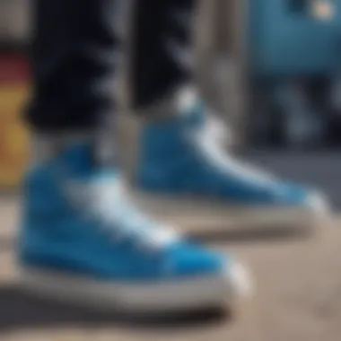 A vibrant pair of blue high top shoes designed for skateboarding.