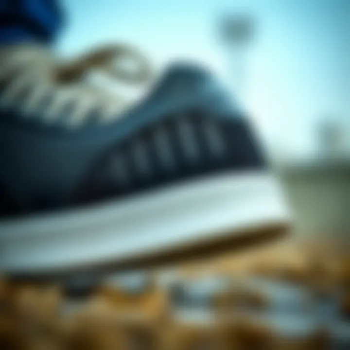 Detailed Design Features of Black Shell Toe Adidas Close-up of black shell toe Adidas showcasing its unique design elements