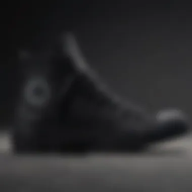 Design Features of All Black Converse Close-up of all black Converse high tops highlighting the design details and texture.