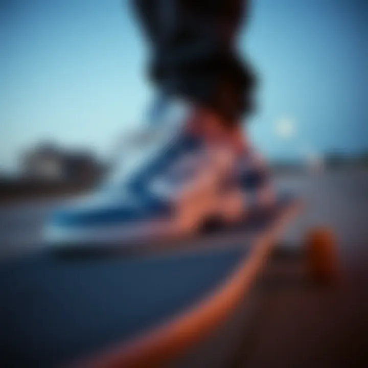 Fila Blue Sneakers on Board Close-up of Fila Blue sneakers on a skateboard