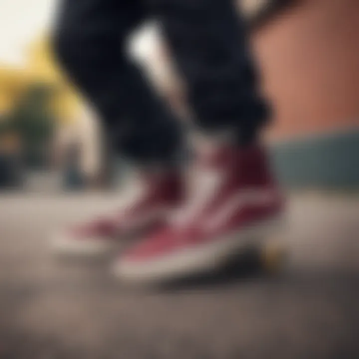 Skateboarder wearing maroon Vans during a trick