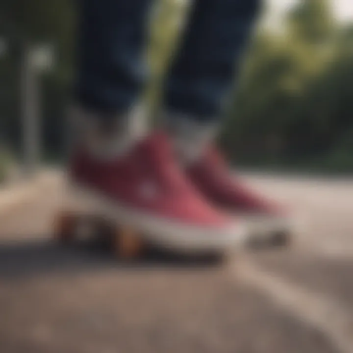 Maroon Vans displayed with complementary skateboarding gear