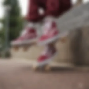 Skateboarding in Maroon and White Vans Skateboarders wearing maroon and white Vans in action