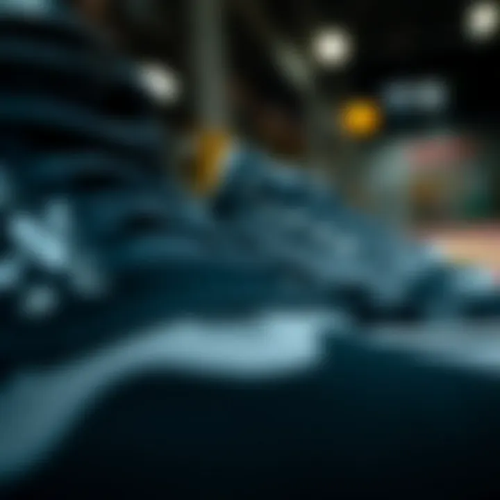 Close-up view of black and grey Vans with intricate design details