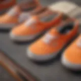 A vibrant collection of orange vans showcasing various styles.