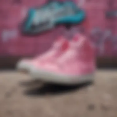 Close-up of pink Nike sneakers with a graffiti backdrop.