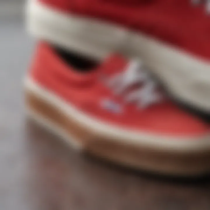 A close-up of red suede Vans showcasing their texture and design.