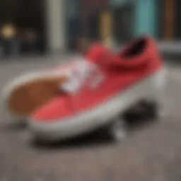 Stylish red suede Vans placed on a skateboard