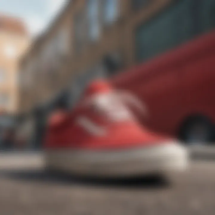 Red suede Vans showcased in an urban environment