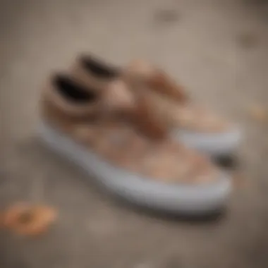 Detailed view of tan floral Vans showcasing intricate patterns.