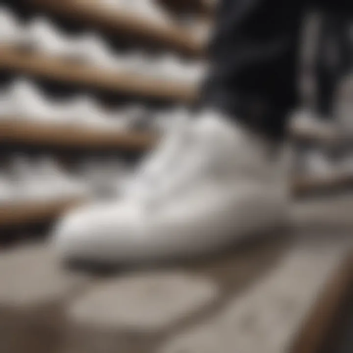 Collection of white shoes with black soles displayed in a skate shop