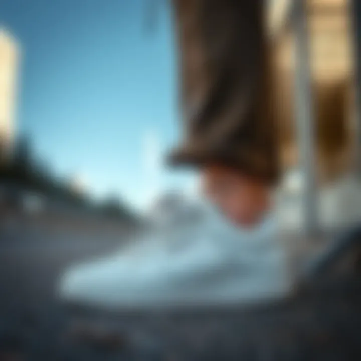 Integration of Forum Low Shoes in Contemporary Fashion Fashionable outfit featuring white Forum low shoes in urban setting