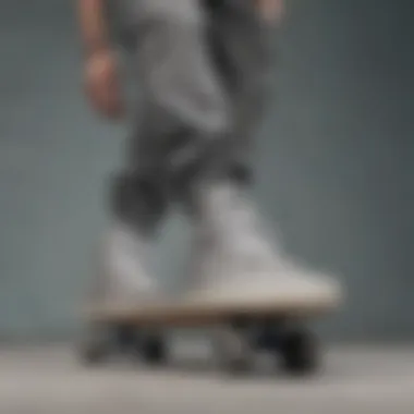 Skateboarding action wearing grey Vans