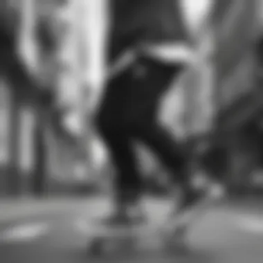 Skateboarder wearing black and white Converse with heart motifs