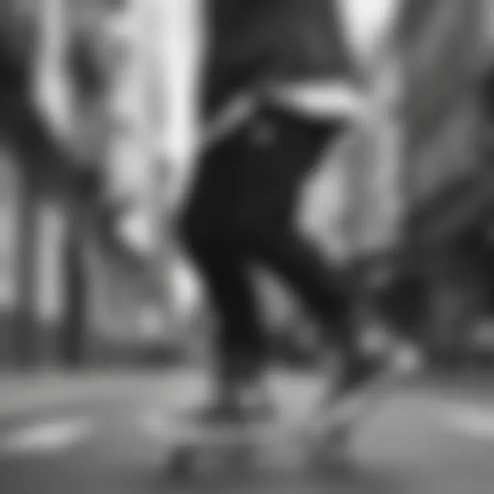 Skateboarder wearing black and white Converse with heart motifs