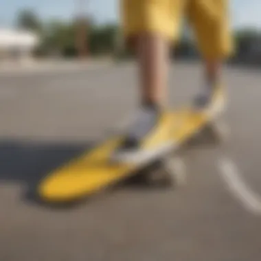 A vibrant pair of yellow Vans shorts displayed on a skateboard ramp.