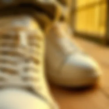 Detailed View of White Leather Convers Close-up of white leather Convers detailing