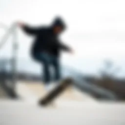 A skater performing tricks while wearing a black windbreaker jacket