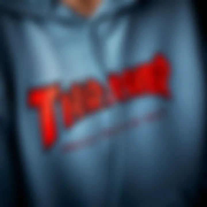 A close-up of the Thrasher logo on a hoodie, symbolizing skate culture.
