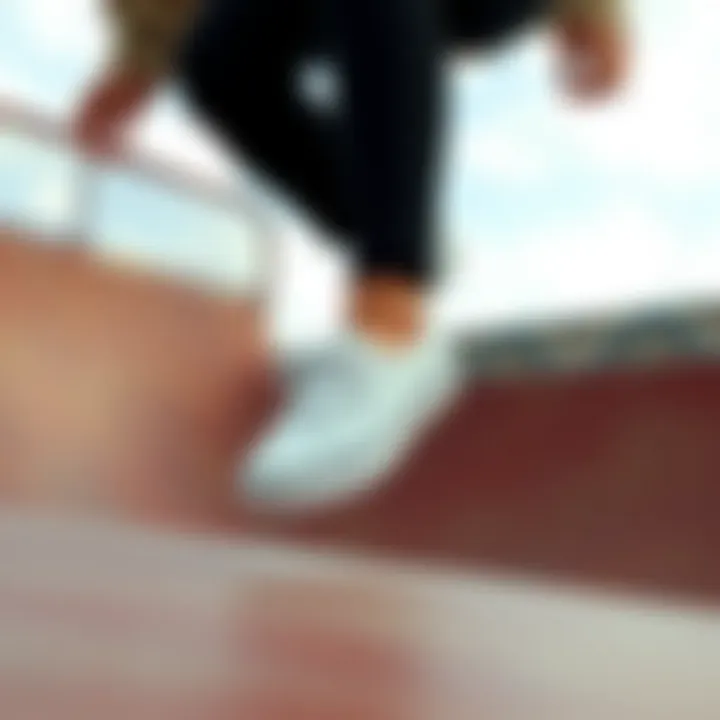 White Slide-On Vans in Action Stylish white slide-on Vans on a skate ramp