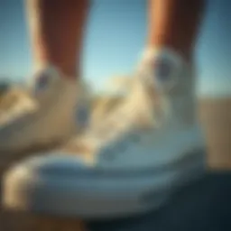 A close-up of cream Converse highlighting its distinctive design and texture