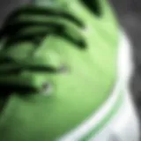 Close-up view of Lakai Griffin Green skateboard shoes highlighting the unique texture and color.