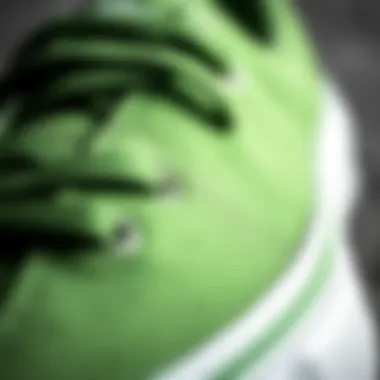 Close-up view of Lakai Griffin Green skateboard shoes highlighting the unique texture and color.