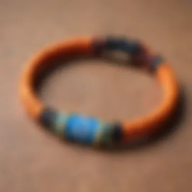 The Rastaclat logo on a bracelet, emphasizing the brand's commitment to social causes.