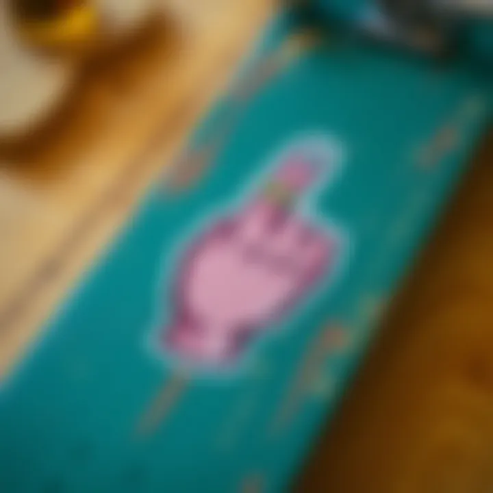 Middle Finger Sticker on Skateboard Deck A close-up of a skateboard deck adorned with a prominent middle finger sticker.