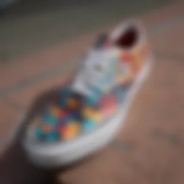 A close-up view of multicolor checkered Vans on a skateboard