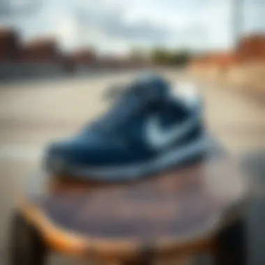 Close-up of navy and white Nike shoes on a skateboard