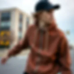 A stylish zip up sweatshirt worn during a skateboarding session on the streets, showcasing its functional design.