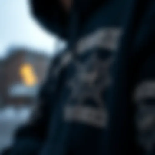 A close-up view of the Hundreds black hoodie showcasing its intricate design elements.