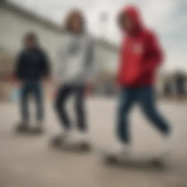 Skaters wearing hoodies in an urban skatepark setting