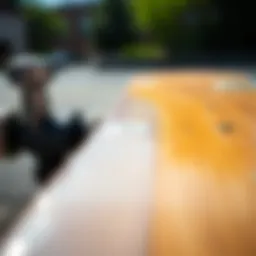 Close-up view of clear grip tape on a skateboard deck