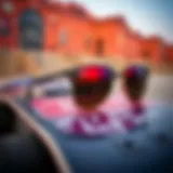 Classic Ray-Ban sunglasses resting on a skateboard