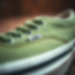 A close-up of thyme green vans showcasing the unique texture and color.