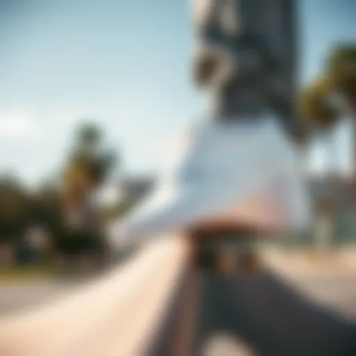Vans Era White shoes on a skateboarding ramp